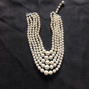 Vintage five strand faux pearl necklace. Unique and beautiful.